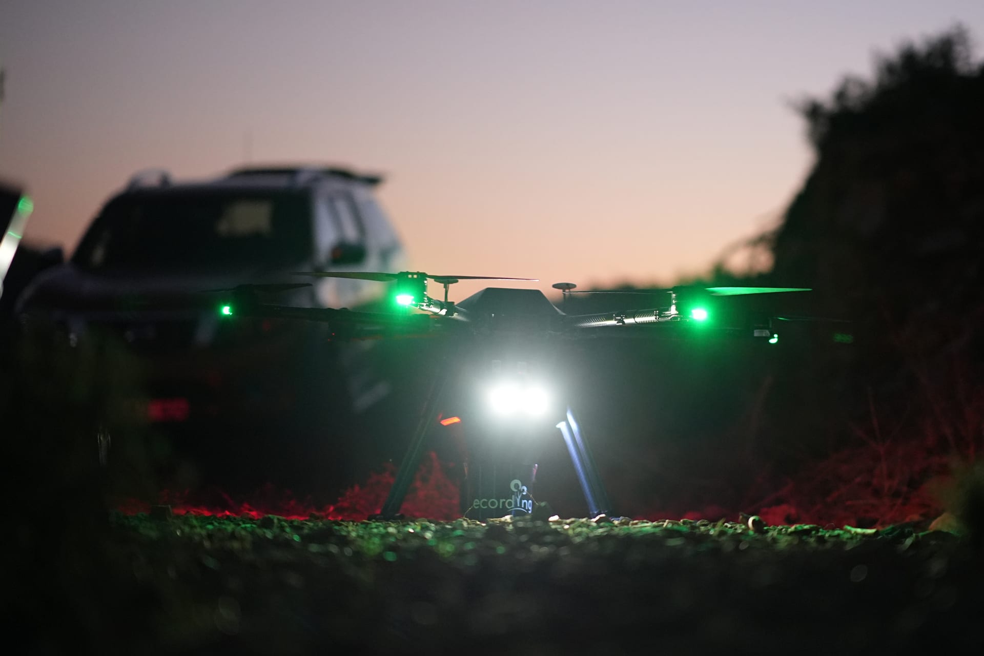 Night drone flight over a planting site